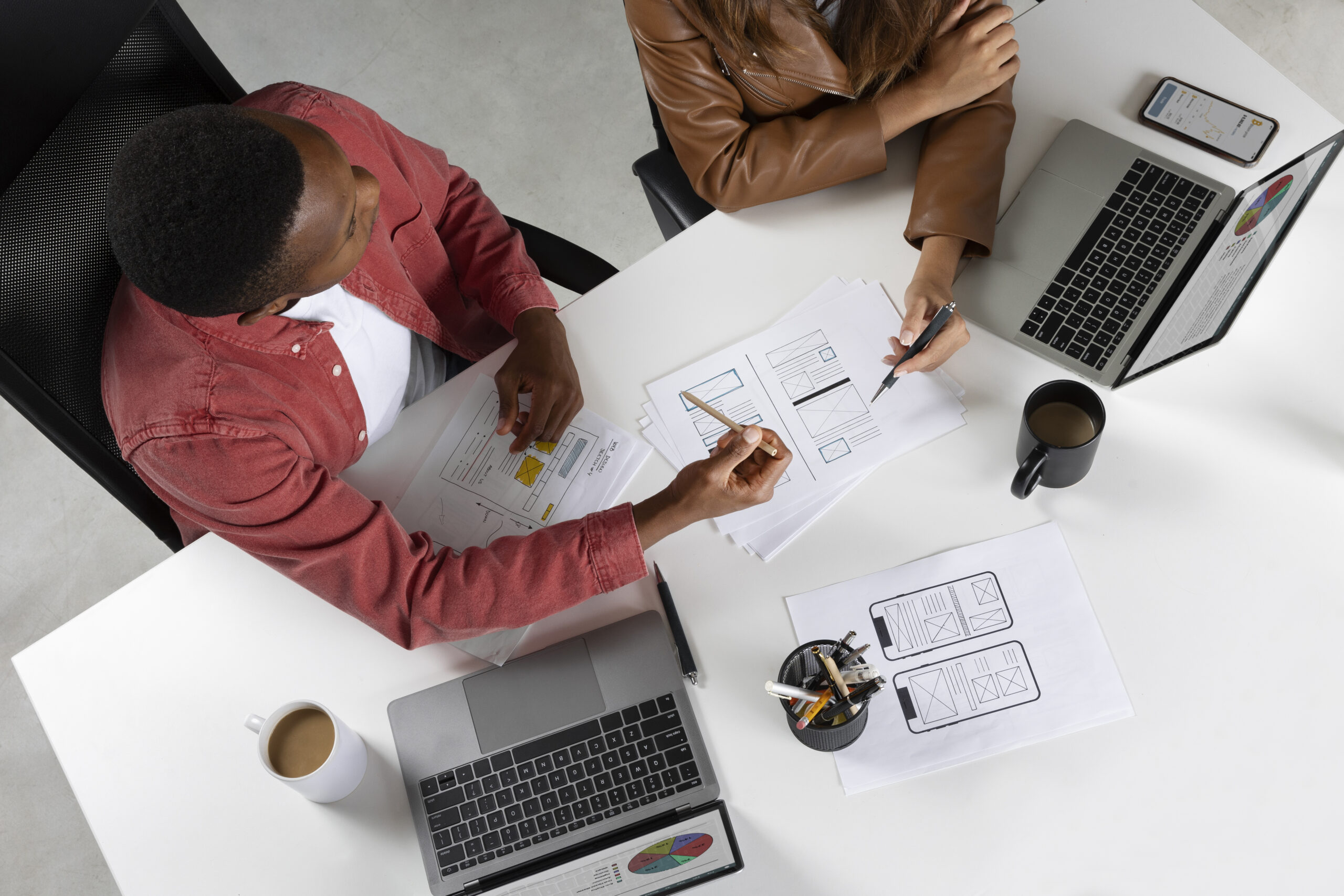 top view people working with laptops